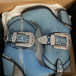 Dolls kill sheriff cowboy Blue booties.